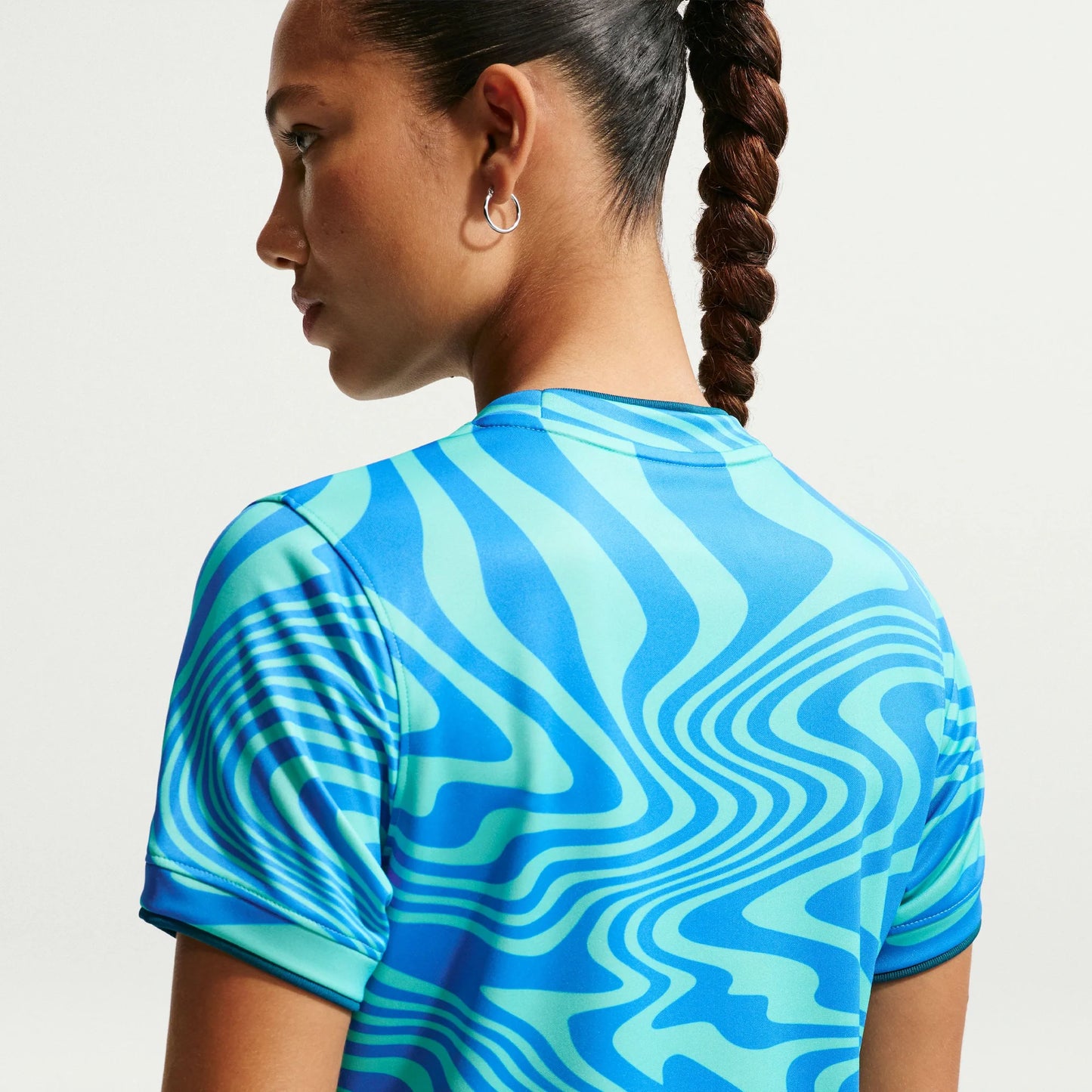 Camiseta Brasil Nike 2026 Pré-Jogo Feminina